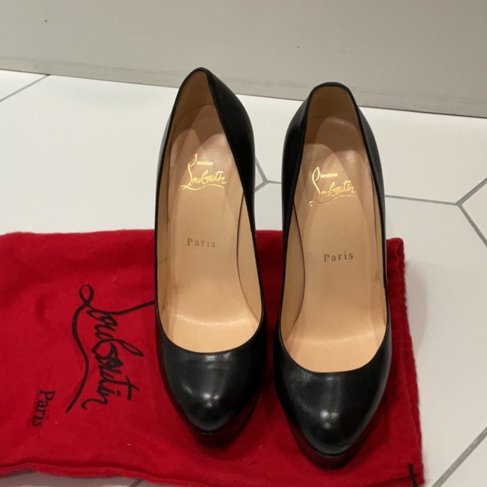 Christian Louboutin platform pumps!